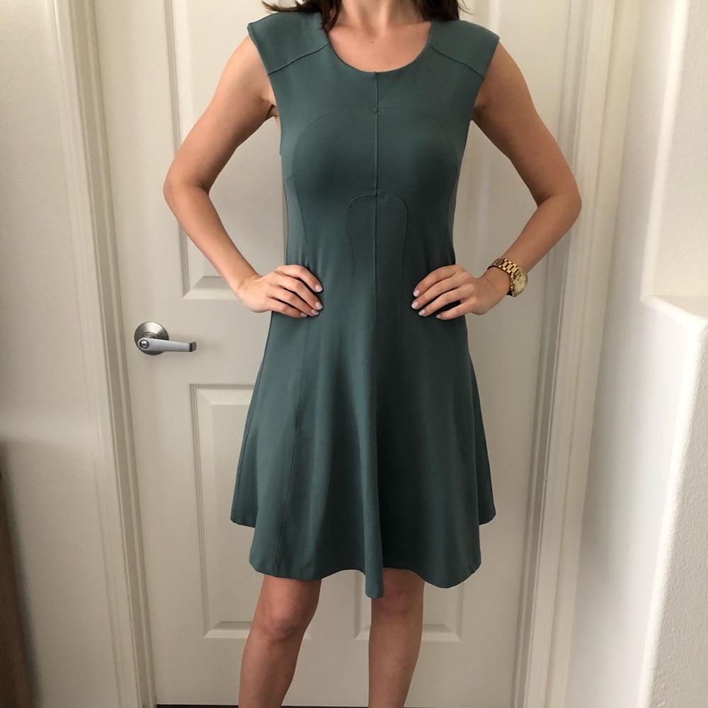 Green form fitting dress